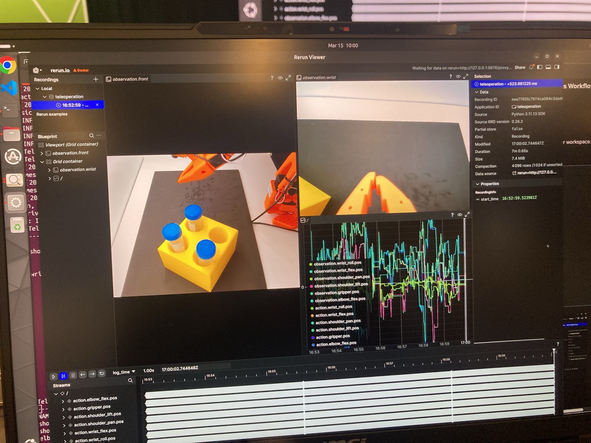Rerun Viewer showing camera feeds and joint action plots during teleoperation