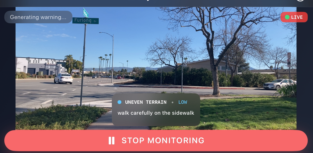 iPhone app main screen showing live camera feed and hazard warnings
